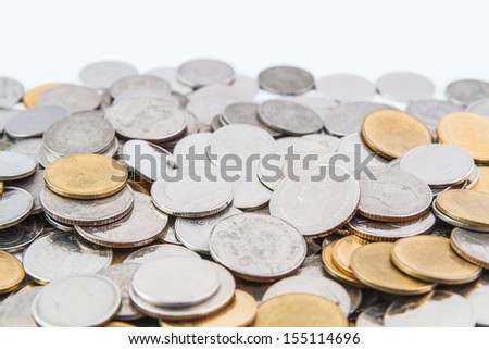 coins stack on book with white background