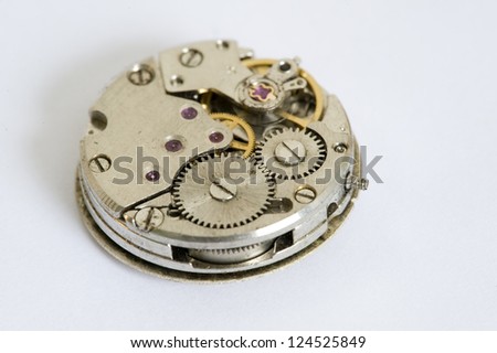 Cogs on back of time piece