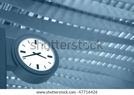 white clock in modern interior