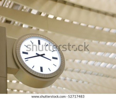 white clock in modern interior