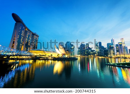 SINGAPORE - APRIL 7: View of Marina Bay on April 7, 2011 in Singapore. Night Scene. Marina Bay is famous destination in Singapore.