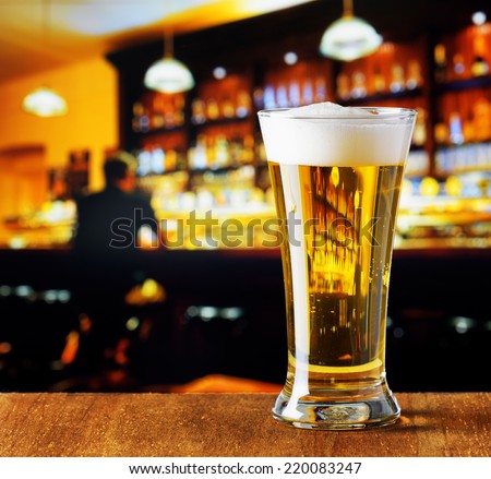 Glass of beer in a bar.