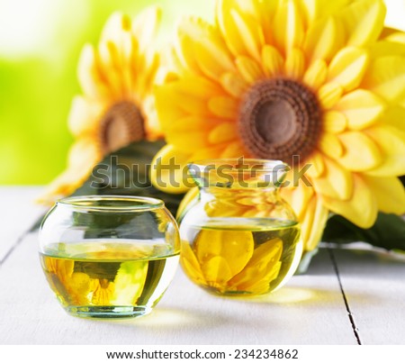 Sunflower oil on a garden table.