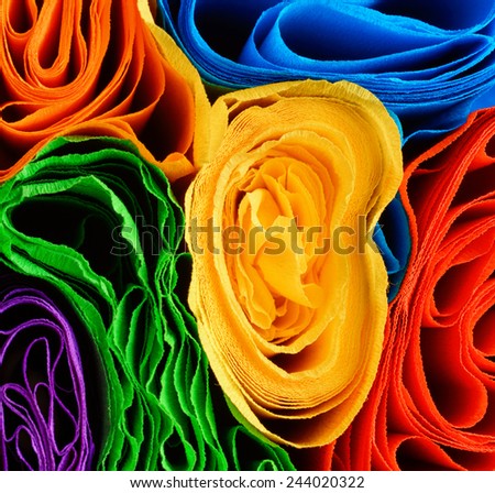 Rolls of various color paper. Abstract background.