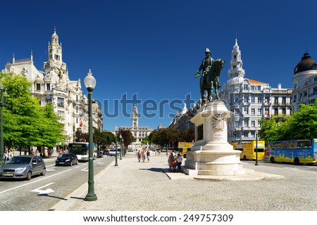 PORTO, PORTUGAL - AUGUST 16, 2014: Monument to the first king of Portugal Don Pedro IV on the Liberty Square in Porto. Porto is one of the most popular tourist destinations in Europe.