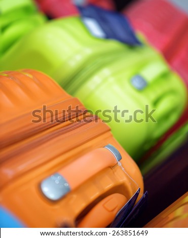 New suitcases of different colors. Shallow DOF.