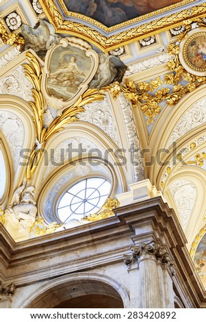 MADRID, SPAIN - AUGUST 18, 2014: Beautiful details of the interior of in the Royal Palace of Madrid in Spain. Madrid is a popular tourist destination of Europe.