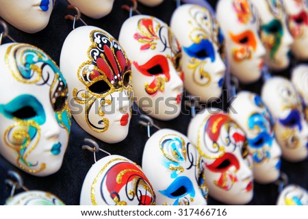 Authentic and original Venetian full-face masks for Carnival in street shop of Venice, Italy. Venice is a popular tourist destination of Europe.