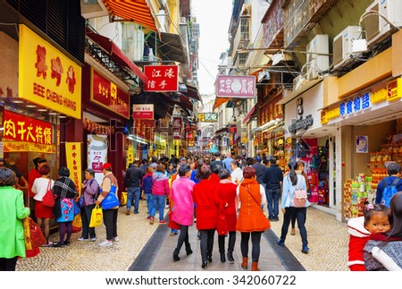 MACAU - JANUARY 30, 2015: Trading in anticipation of the Chinese New Year, of the Spring Festival in the historic centre of Macau. Macau is a popular tourist attraction of Asia in the holidays.