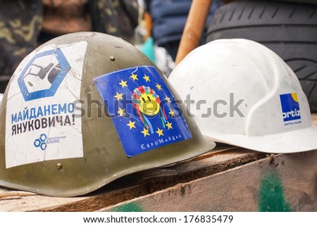 Kiev-circa February, 2014. Ukrainian military helmets with Euromaidan's revolutionary slogans against President Yanukovych.