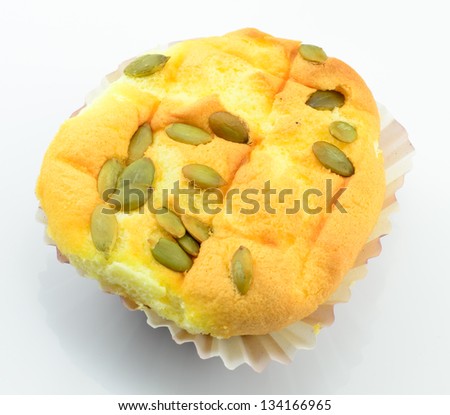 Chiffon cake with Pumpkin seeds on white background