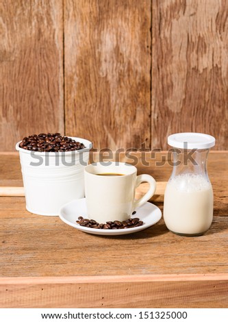 coffee cup and coffee beans and milk