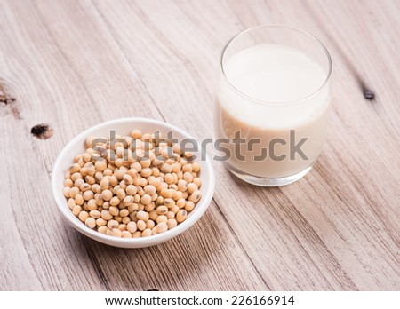 Soybeans and soy milk in a glass.