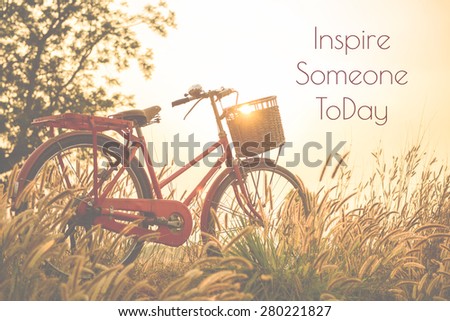 beautiful landscape image with Bicycle  at sunset  ; life quote. Inspirational quote. Motivational background