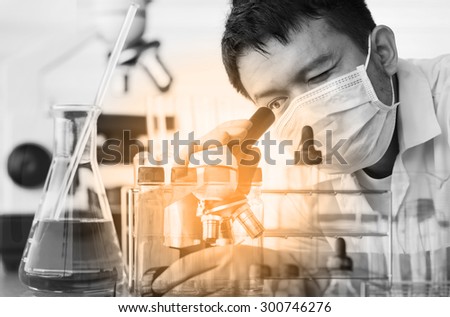 Chemist is analyzing sample in laboratory room
