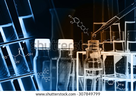 Researcher is dropping the reagent into test tube, with chemical equations background, in laboratory