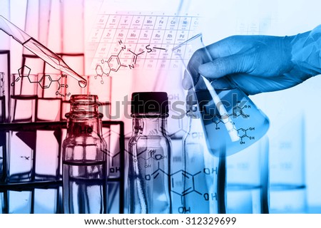 Researcher is dropping the reagent into test tube, with chemical equations background, in laboratory