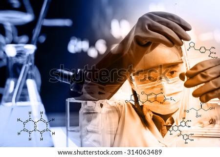 scientist with equipment and science experiments,Laboratory glassware containing chemical liquid, science research with chemical equations.
