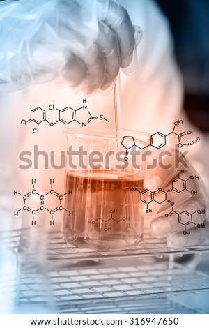 Hands of clinician holding tools during scientific experiment ,Researcher is dropping the reagent into test tube, with chemical equations background, in laboratory
