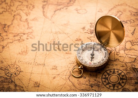 Compass on old map vintage style