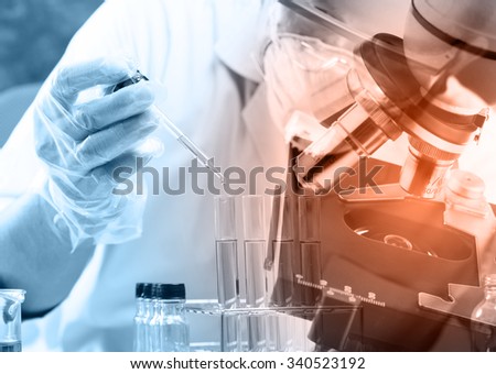 scientist  dropping chemical liquid to flask with lab glassware and microscope, Laboratory research concept ;double exposure style