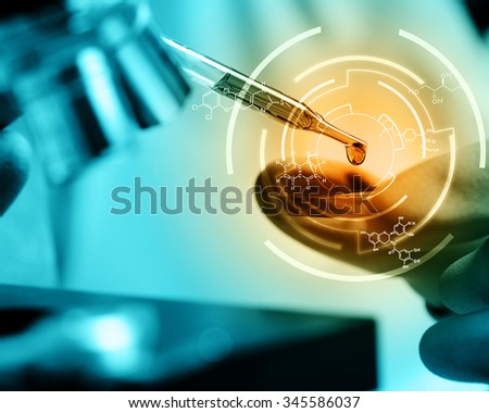 Scientist  dropping chemical liquid to microscope with chemical equations , Laboratory research concept