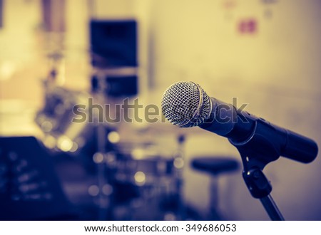 Microphone in a recording studio with out of focus background : Vintage tone style