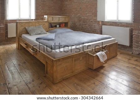 wooden bed with drawer