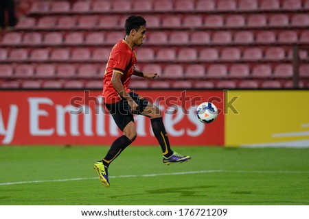 NONTHABURI-FEB 8,Teerasil Dangda of MTUTD UTD controls the ball playing during  AFC Champions League 2014 between SCG Muangthong utd and Hanoi T&T at SCG Stadium on February8,2014 in Thailand