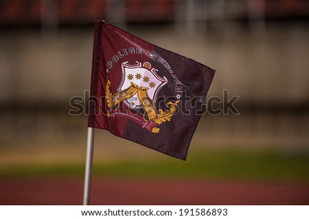 PATHUMTHANI THAILAND-MAY 05:The Police United flag waving on the wind a Thai Premier League match between Police Utd.and Songkhla Utd.at Thammasat Stadium on May 05,2014,Thailand