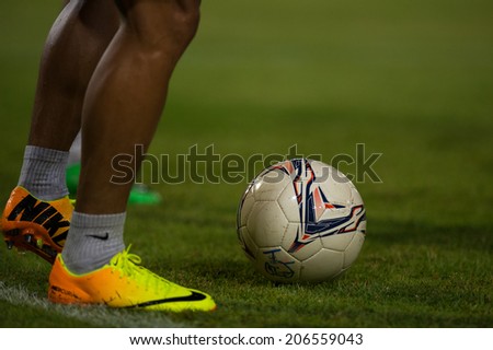 PATHUMTHANI THAILAND-Jul19:Soccer shoes or football during the Thai Premier League between Police United and Sisaket FC at Thammasat Stadium on July 19,2014,Thailand