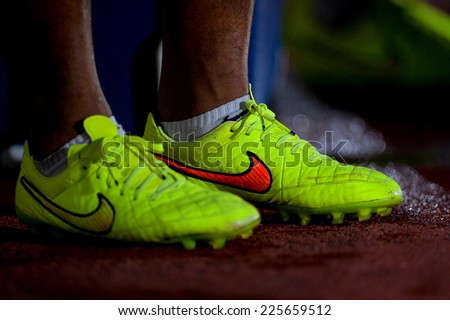 BANGKOK THAILAND-Oct15:Detail of soccer cleats during a match Thai Premier League Between Army Utd F.C.and Chonburi F.C.at Royal Thai Army Stadium on October15,2014 in Thailand