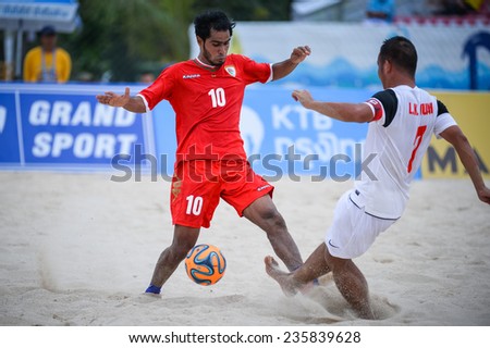 PHUKET THAILAND-NOV19:AL BALUSHI Abdullah Saleh Omar(R) of Oman during the Beach Soccer match between Oman and Vietnam the 2014 Asian Beach Games at Saphan Hin on November19,2014 in Thailand