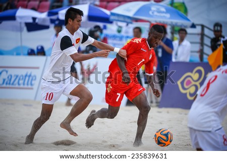 PHUKET THAI-NOV19:Masoud Salim AL SAUTI Abdullah(red)of Oman in action during the Beach Soccer match between Oman and Vietnam the 2014 Asian Beach Games at Saphan Hin on November19,2014 in Thailand