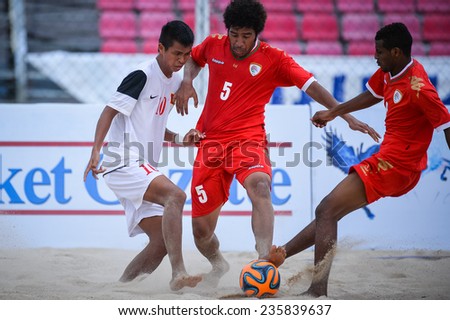 PHUKET THAI-NOV19:AL ARAIMI Mandhar Hilal Hamed(R)of Oman contest the ball during the Beach Soccer match between Oman and Vietnam the2014 Asian Beach Games at Saphan Hin on November19,2014in Thailand