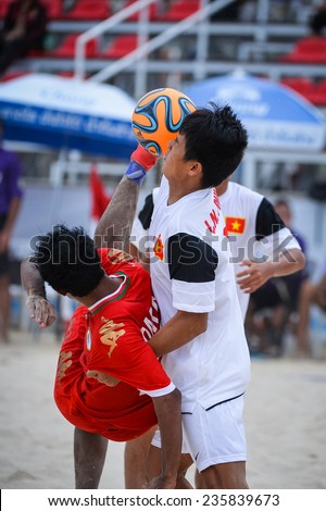 PHUKET THAILAND-NOV19:unidentified players during (red) of Oman kicks during the Beach Soccer match between Oman and Vietnam the 2014 Asian Beach Games at Saphan Hin on November19,2014 in Thailand