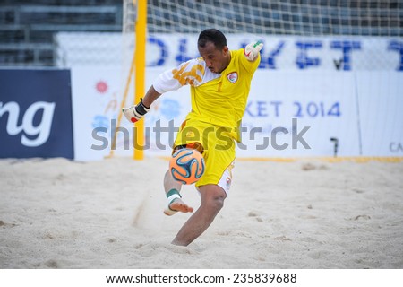 PHUKET THAILAND-NOV19:Goalkeeper AL FARSI SAID Ali of Oman hit the ball during the Beach Soccer match between Oman and Vietnam the 2014 Asian Beach Games at Saphan Hin on November19,2014 in Thailand