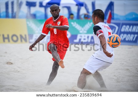 PHUKET THAILAND-NOV19:Yaqoob Rabia Al Alawi(R)of Oman in action during the Beach Soccer match between Oman and Vietnam the 2014 Asian Beach Games at Saphan Hin on November19,2014 in Thailand
