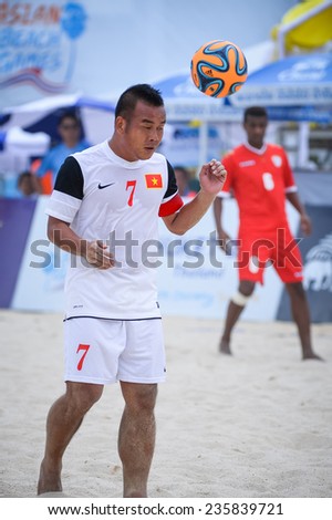 PHUKET THAILAND-NOV19:LE Kim Tuan(W) of Vietnam heads the ball during the  Beach Soccer match between Oman and Vietnam the 2014 Asian Beach Games at Saphan Hin on November19,2014 in Thailand