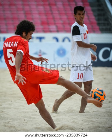 PHUKET THAILAND-NOV19:AL ARAIMI Mandhar Hilal Hamed#5 of Oman kicks the ball during Beach Soccer match between Oman and Vietnam the 2014 Asian Beach Games at Saphan Hin on November19,2014 in Thailand