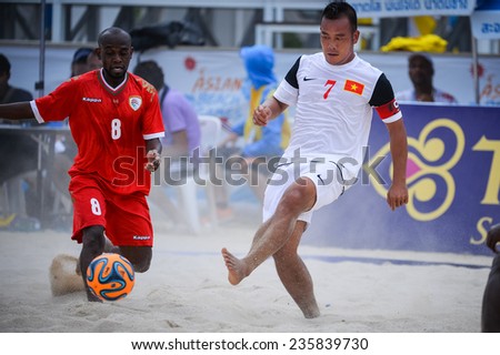 PHUKET THAILAND-NOV19:LE Kim Tuan(W)of Vietnam kicks the ball during the  Beach Soccer match between Oman and Vietnam the 2014 Asian Beach Games at Saphan Hin on November19,2014 in Thailand
