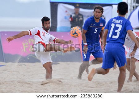 PHUKET THAI-NOV19:Mohammad Ahmadzadeh(W)of Iran kicks the ball during the  Beach Soccer match between Iran and Thailand the 2014 Asian Beach Games at Saphan Hin on November19,2014 in Thailand