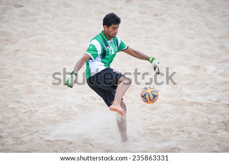 PHUKET THAILAND-NOV19:Goalkeeper Hamid Behzadpour of Iran kicks the ball during the Beach Soccer match between Iran and Thailand the2014 Asian Beach Games at Saphan Hin on November19,2014 in Thailand