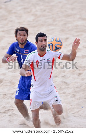 PHUKET THAILAND-NOV19:Mohammadali Mokhtari#9 of Iran in action during the Beach Soccer match between Iran and Thailand the 2014 Asian Beach Games at Saphan Hin on November19,2014 in Thailand