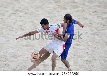 PHUKET THAILAND-NOV19:Mohammadali Mokhtari(W)of Iran kicks the ball during the Beach Soccer match between Iran and Thailand the 2014 Asian Beach Games at Saphan Hin on November19,2014 in Thailand