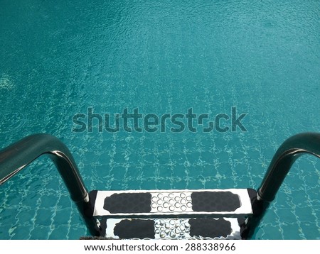 Swimming pool with stair at home close up