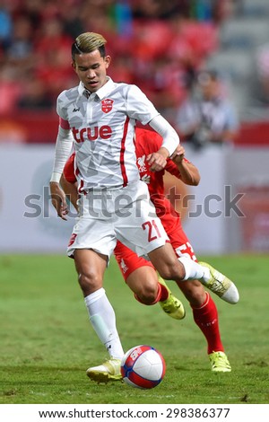BANGKOK THAILAND JULY 14 :Sanrawat Dechmitr of Thai All Stars in action during the international friendly match Thai All Stars and Liverpool FC at Rajamangala Stadium on July14,2015 in,Thailand.