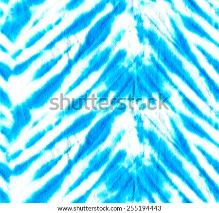 beautiful seamless turquoise tie dye pattern. vibrant stripes in blue shades.