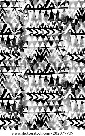 seamless tribal pattern with geometric motifs and splashes of color. ethnic design, ornamental details. black and white, monochrome palette. for fashion or interior