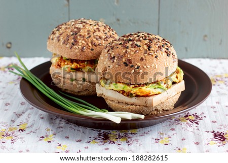Vegetarian burgers with wholegrain buns, tofu and vegetable pancakes